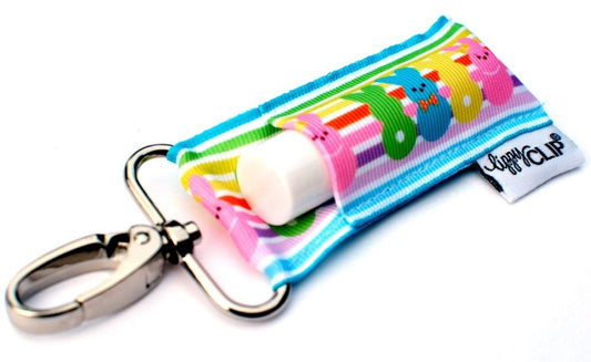 Lippy Clips Rainbow BunniesKeep your lip balm within reach! Made and packaged in the US.