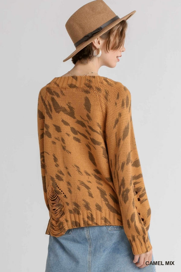 Umgee Animal Print Round Neck Distressed Sweater